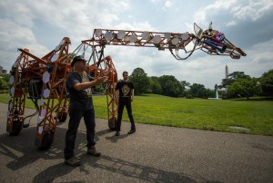 Decorative image of mechanized giraffe sculpture from White House Maker Faire