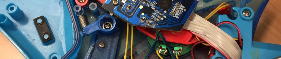 Decorative: Photo of inside of toy electronic guitar