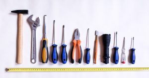 Photo of a line-up of toolbox tools - public domain from Pixabay.com